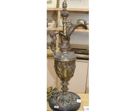 A large gilt cast metal Florentine style ewer table lamp