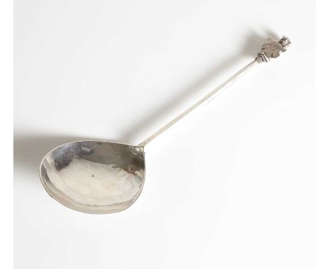 A 17th-century Dutch silver spoon, by Jargen Arents, c.1684, the cast finial formed as an animal, supporting a shield inscrib