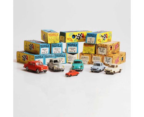 A collection of Norev toy cars, 20th century, comprising twenty-one model cars and trucks manufactured by Norev, fifteen of w