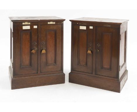 John Ruskin (1819-1900),  a pair of mahogany folio cabinets, 19th century, each moulded top with inlaid ivory labels, over a 