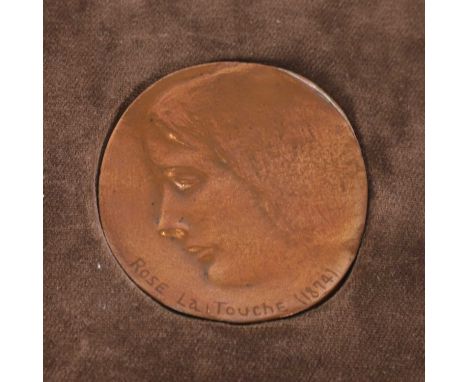 John Ruskin (1819-1900), a 'Rose La Touche' medallion, dated 1874, copper,medallion 7 x 6cm, framed and mounted