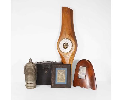 A group of aeronautical folk art, to include:a propeller barometer,91cm long,two framed photographs, one in a frame formed as