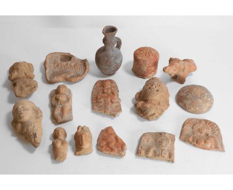 A collection of Chandraketugarh terracotta pottery, Bengal, comprising fragments relief-moulded with deities, an oil vessel a