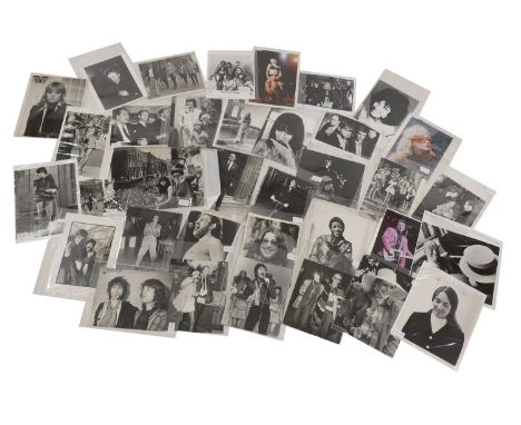 A collection of pop music press photography, 20th century, press photographs of famous pop musicians, including The Rolling S
