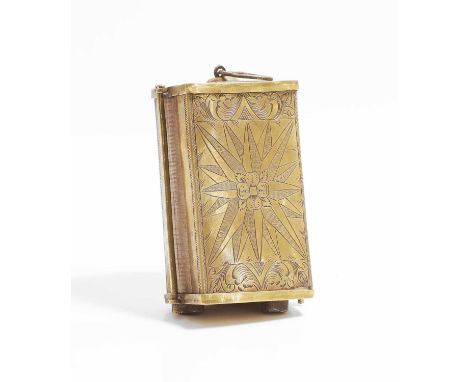 A rare French brass-mounted lodestone, early 18th century, comprising a roughly shaped piece of magnetite set with iron rods,