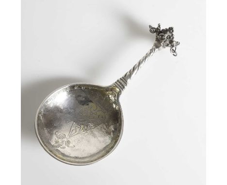 A Swedish silver spoon, c.1600, partially gilt, the cast finial with four ringed branches above a wrythen stem, over an ovoid