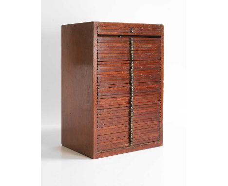 A George III coin collector's cabinet, mid-18th century, the mahogany frame with forty-seven drawers, opening to reveal pierc