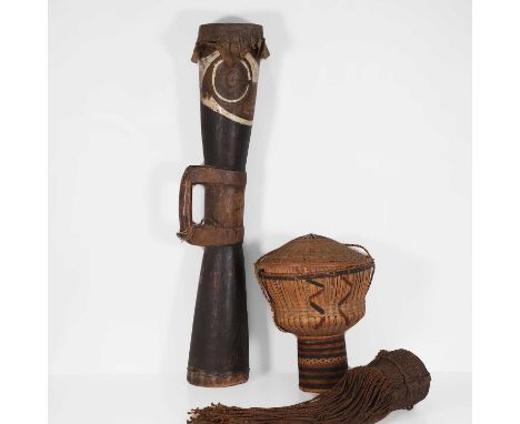 Three African objects, 20th century, a woven basket from Cameroon, a woven headdress, and a drum from Papua New Guinea, drum 