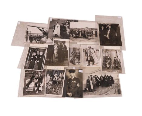 Photographs of Romanian royalty, 20th century, comprising thirteen silver gelatin print photographs, stamped verso,largest 27
