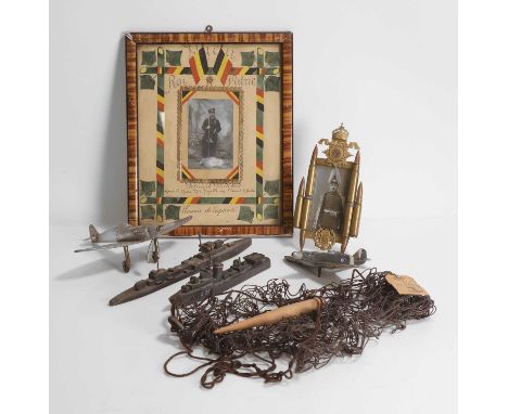 A collection of military folk art, 20th century, comprising:a rabbit snare made by a St Dunstan's war-blinded soldier,two Sec