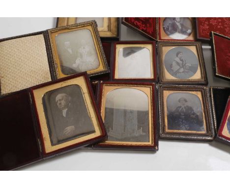 A group of daguerreotypes, mid-19th century, comprising a group of portraits, three portraits of children, one of which is ov
