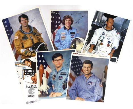 A collection of photographs of astronauts, 20th century, consisting of thirty photographic prints, mostly portraits of astron