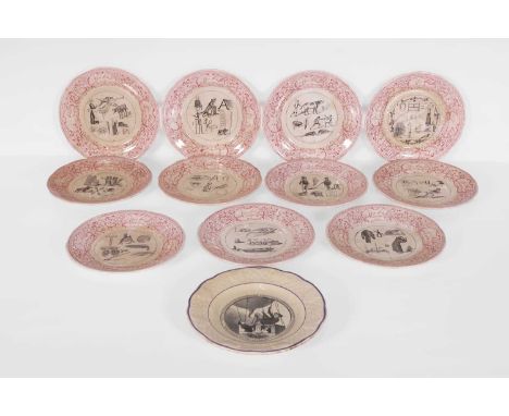 A set of twelve rebus plates, 19th century, French, including examples by Digoin Sarreguemines, each plate featuring a pictur