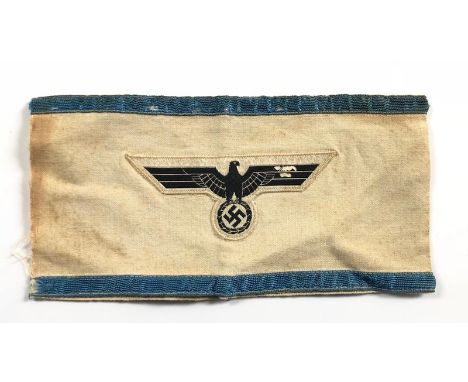 German Third Reich Army Air Defence Leader armband.   Good rare white linen band, edged with applied blue braid, bearing blac