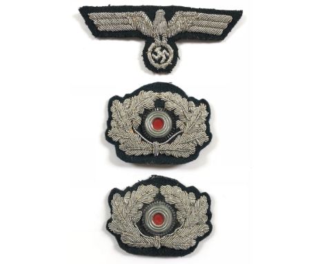 German Third Reich Heer Army Officer insignia. Good scarce silvered aluminium wire breast eagle and swastika on dark green fe
