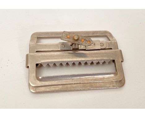 WW2 SOE /  RAF Escape and Evasion compass buckle.   A scarce  example of the Battledress Blouse metal buckle. A sliding cover