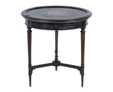 A Victorian ebonised, gilt decorated and inlaid marble circular centre table:, the black marble top inlaid with a butterfly a