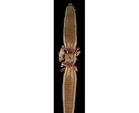 A lady's 9ct gold ruby and diamond mounted wristwatch: with rectangular dial stamped 'Josarn' concealed beneath a hinged cove