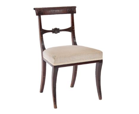 Of Royal Interest A Regency mahogany dining chair:, the back with reeded and ebony strung curved bar top rail and reeded hori