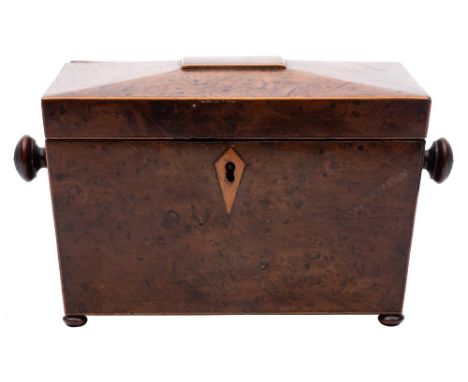 A Regency burr yew and boxwood strung tea caddy: of sarcophagus outline, the shallow domed hinged top enclosing two lidded co