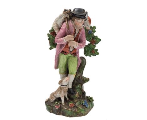 A Staffordshire pearl glazed pottery figure of 'The Lost Sheep Found': the shepherd carrying the sheep on his shoulders, his 