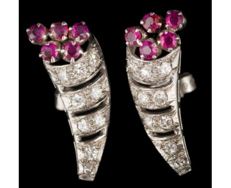 A pair of ruby and diamond cornucopia cluster earrings: each with a diamond-set horn with ruby cluster, 5gms gross weight. 