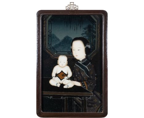 A 20th century Chinese reverse painting on glass: depicting a mother with her child seated on a table, 50cm x 31cm