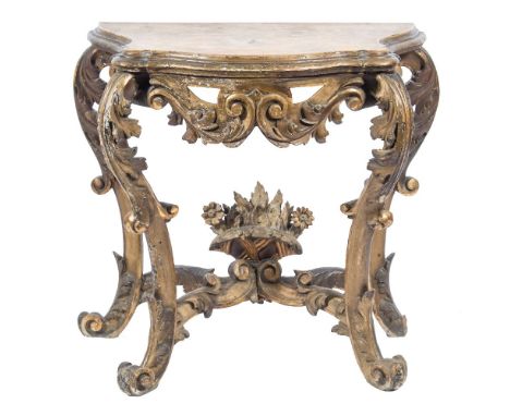 A 19th Century French carved giltwood console table:, of serpentine outline with a moulded top and pierced acanthus scroll ap