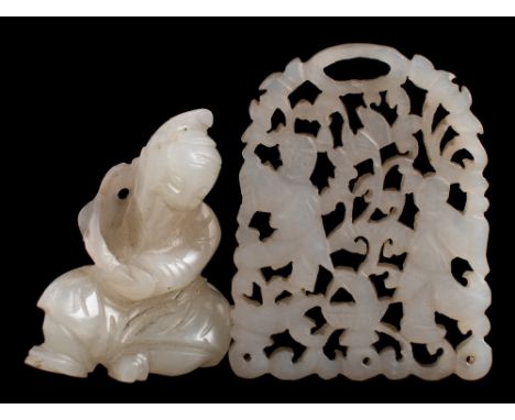 A Chinese jade boulder pendant and two small pendants: the first in the form of Shao Lao wearing flowing robes, the celadon c