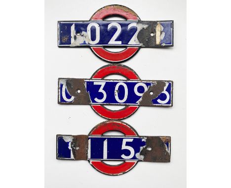 London Transport enamel Stock Plates, qty 3 comprising: 013093; 10221; 1115. All have damage.(3 items)