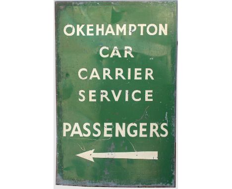 Aluminium Sign OKEHAMPTON CAR CARRIER SERVICE PASSENGERS with left facing arrow beneath. Measures 27.5in x 33in.