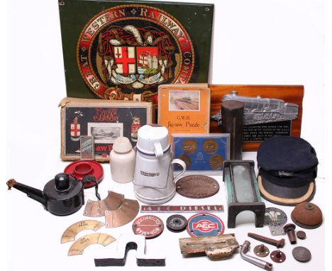 A railway Cap with a double arrow badge; x2 boxed GWR Jigsaws, The Cheltenham Flyer and The Cornish Riviera Express (not made