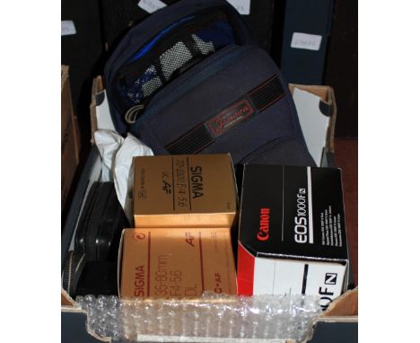 A Canon EOS camera, lenses etc.