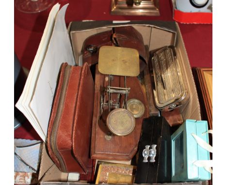 		A box of sundries to include letter scales, cased weights, spirit level etc.