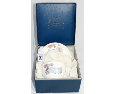		A Royal Worcester presentation cup and saucer, boxed