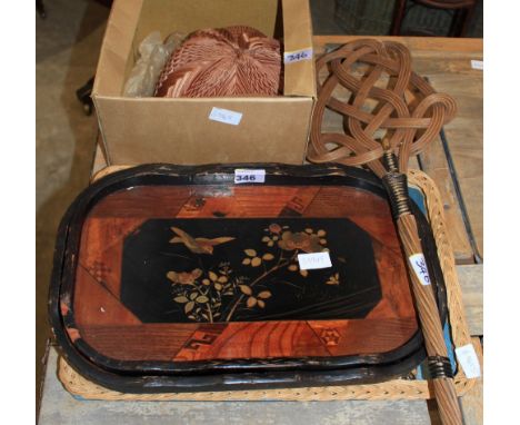 		A pair of inlaid trays, two others, a 1950's hat and a carpet beater