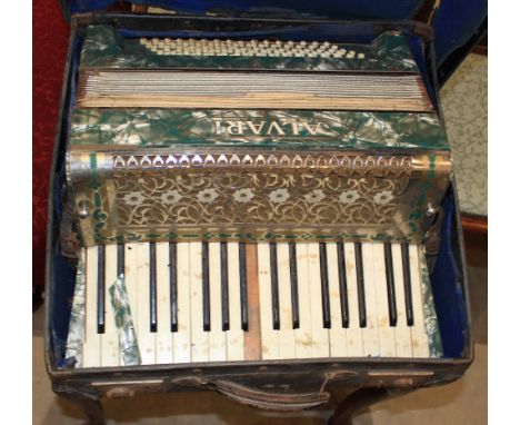 		A cased piano accordion