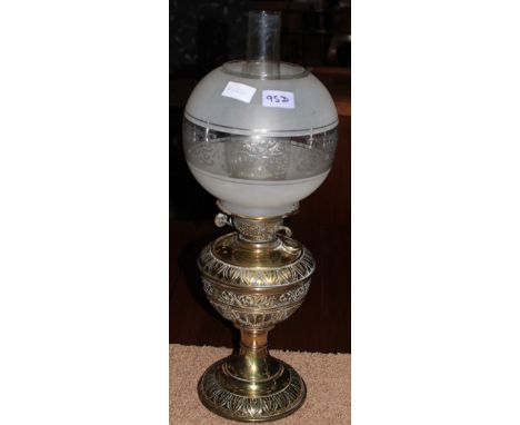 		A brass oil lamp. 19th Century. 22 high A brass oil lamp. 19th Century. 22' high"