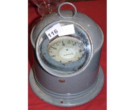 		A gimbal compass, the dial signed 'Sestrel' 8 ½' high