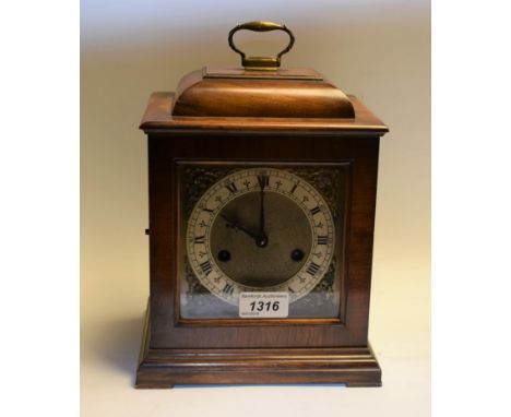 A Smiths mantel clock, mahogany case, twin winding holes