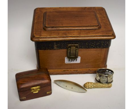 A George III mother of pearl bobbin; a carved bone needlecase; a wooden box; etc.