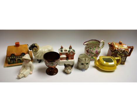 Ceramics - a Cottage ware teapot; a similar cheese cover; a lustreware jug; a similar chalice; a figure of a ram; a lustrewar