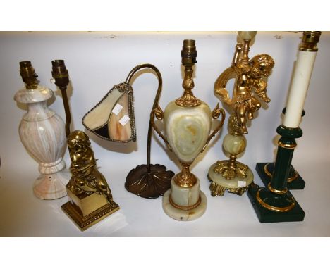 Lighting - an onyx and gilt metal table lamp, the column modelled as a putto; another, urnular; an Art Nouveau style lily pad