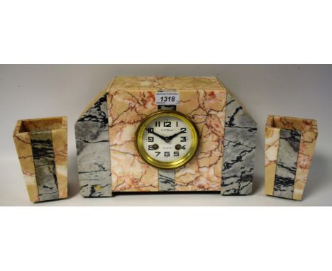 A French Art Deco style three piece clock garniture