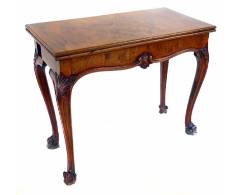 Early 20th century figured walnut card table, rectangular top folding open to concertina base with four moulded French legs, 