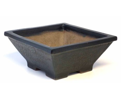 Lucie Rie (1902-1995) Bonsai pot, with four feet and black glazed exterior, monogram to base, 37cm wide   Bought from Bonham'