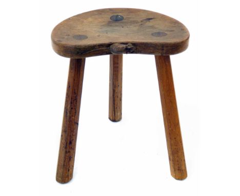 Robert "Mouseman" Thompson oak calf stool, with three octagonal legs and carved mouse signature, 35.5cm high    Condition rep