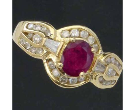 14ct (585) gold ruby and diamond ring, the central stone surrounded by small brilliants and baguettes, ring size N, gross wei