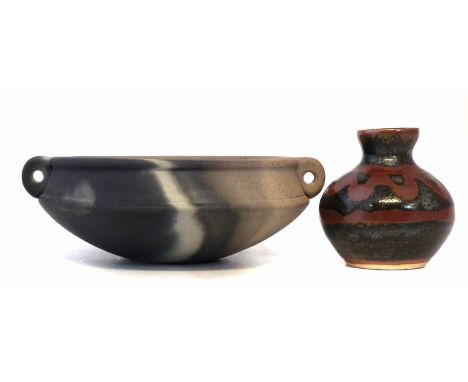 John Leach Muchelney pottery bowl, with twin ring handles and blended matt smoke glazed body, also a John Leach small vase, i