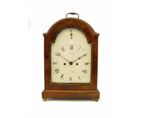 A Regency mahogany cased table clock, the white enamel dial signed Baker, Tamworth, with arched top, the double fusee movemen